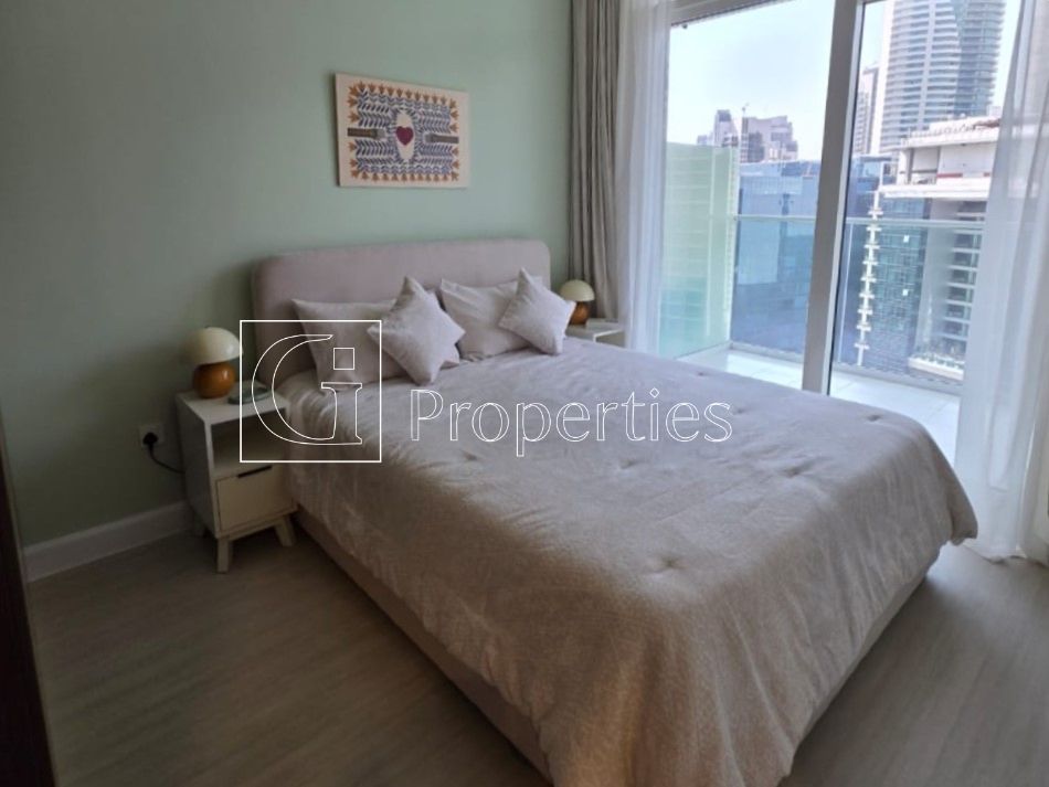 Fully Furnished | Pool and Burj View | High Floor - 7