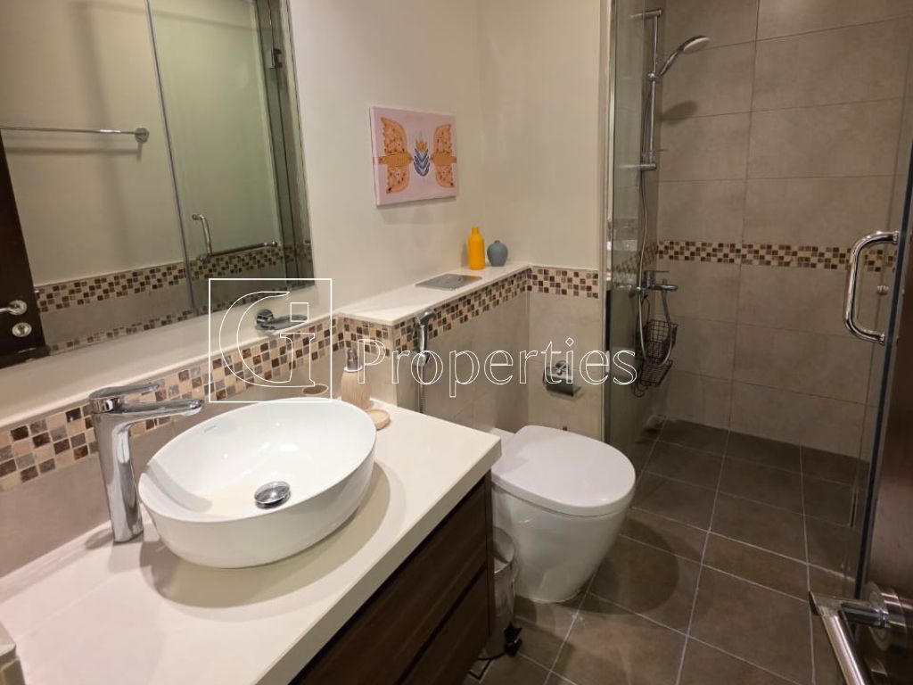 Fully Furnished | Pool and Burj View | High Floor - 9