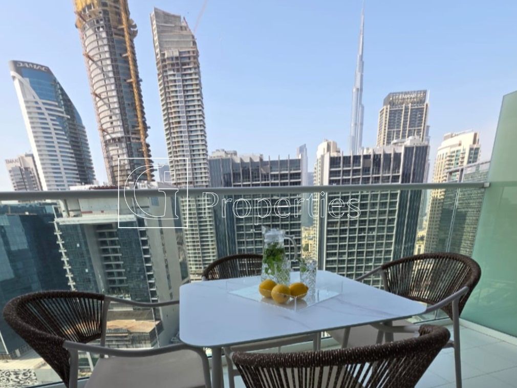 Fully Furnished | Pool and Burj View | High Floor - 10