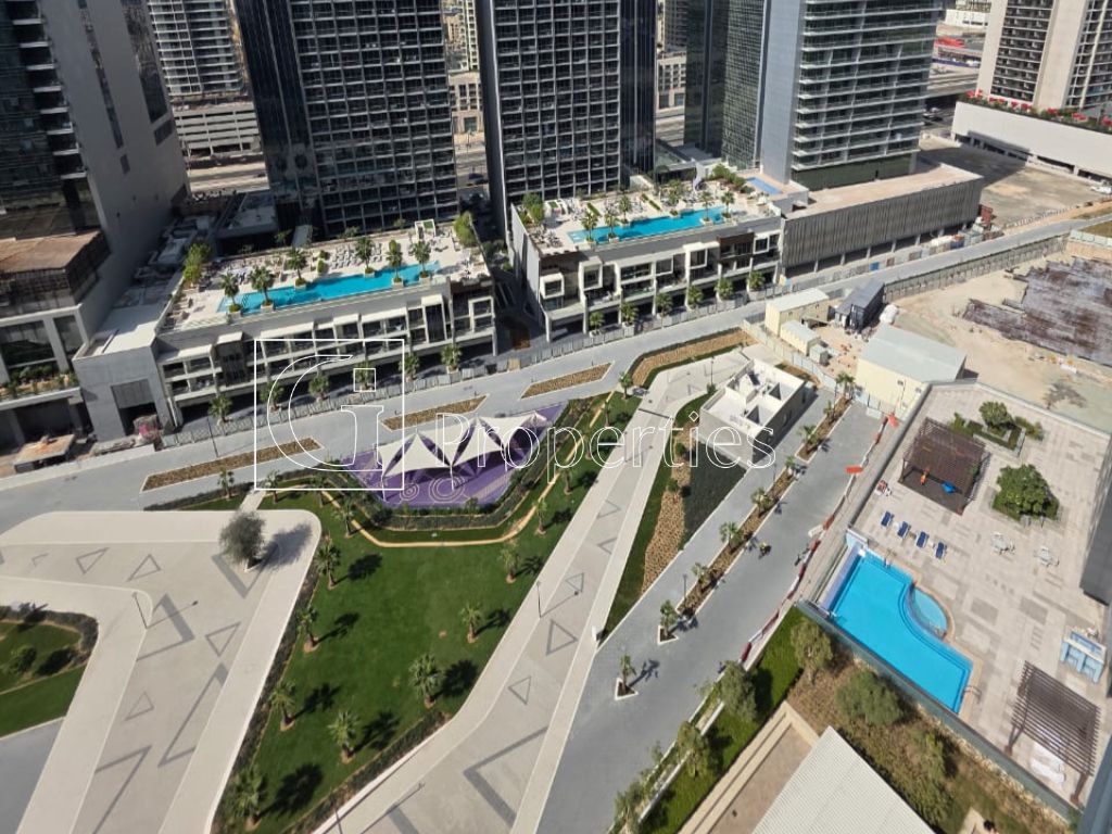 Fully Furnished | Pool and Burj View | High Floor - 13